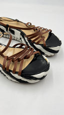 Sandali platform con suola intrecciata Pollini