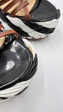 Sandali platform con suola intrecciata Pollini