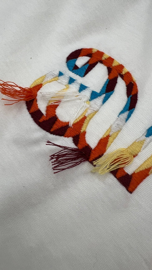 T-shirt crop con maniche in maglia