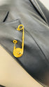 Blazer in pelle con spilla