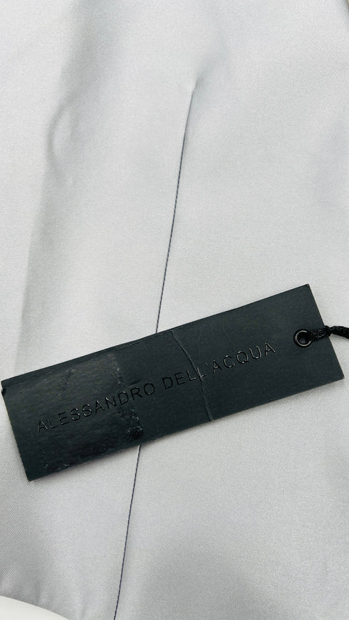 Gilet in raso con cartellino