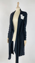 Cardigan asimmetrico nero con cartellino
