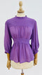 Blusa con fiocco