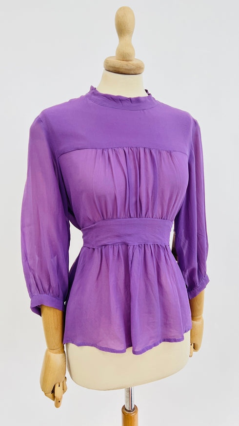 Blusa con fiocco