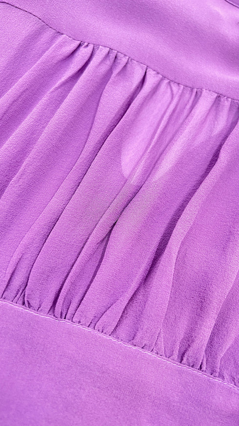 Blusa con fiocco