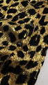 Abito wrap animalier in paillettes