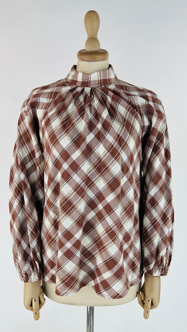 Blusa check pieghe sul collo