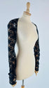 Coprispalle in pizzo nero