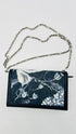 Borsa in denim con fiori dipinti