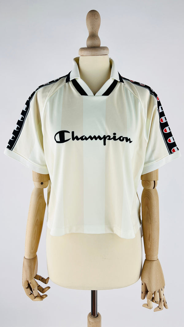 Polo a righe con cartellino