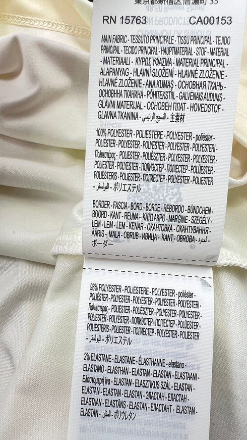 Polo a righe con cartellino