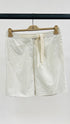 Shorts in seta a righe
