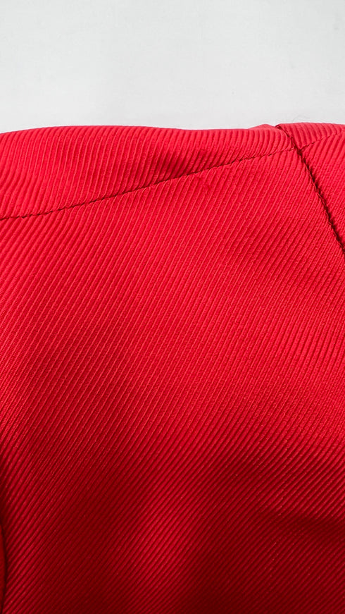 Blusa rossa con fiocco