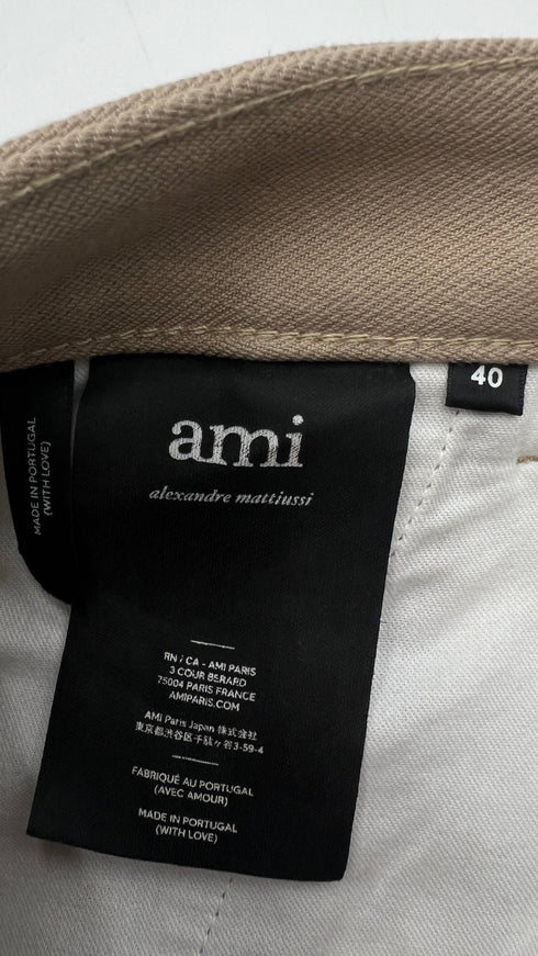 Pantaloni beige a gamba larga