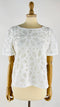 T-shirt con pizzo bianco