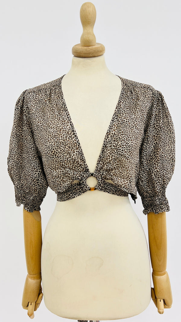 Top animalier con cartellino