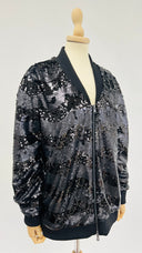 Bomber nero di paillettes con cartellino Emporio Armani