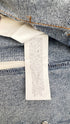 Gilet patchwork con cartellino
