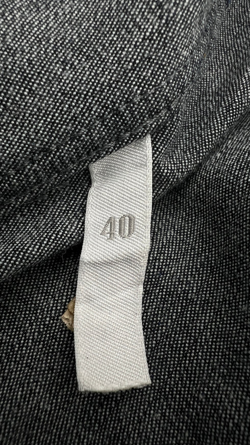 Smanicato in denim con frange