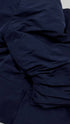 Bolero blu con cartellino