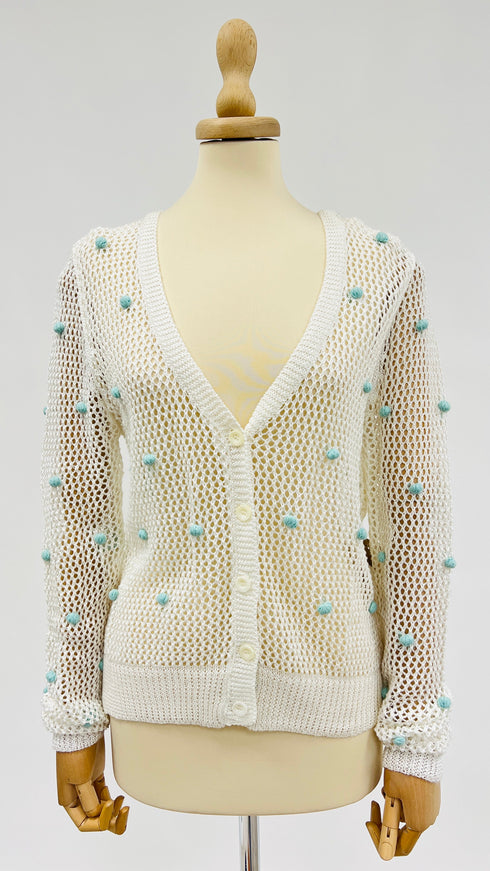 Cardigan a rete con pon-pon