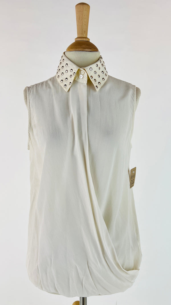 Blusa con cartellino