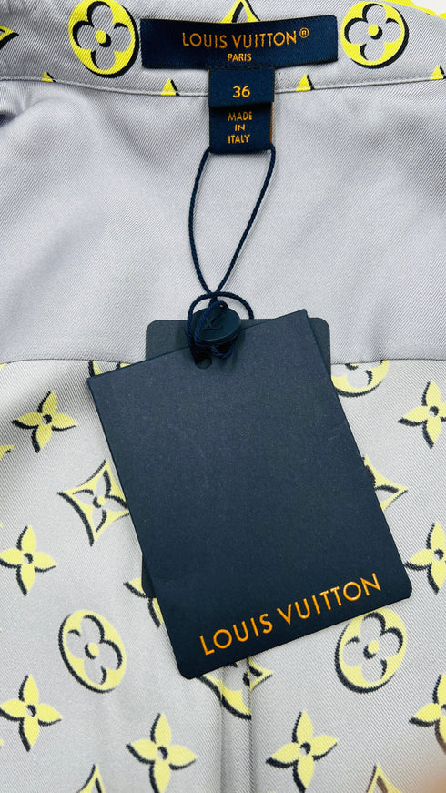 Completo in seta con cartellino