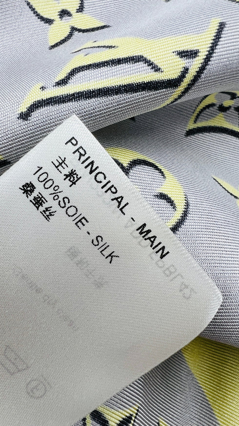 Completo in seta con cartellino