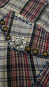 Camicia tartan con ricami e appliqués