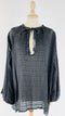 Blusa in lino goffrato