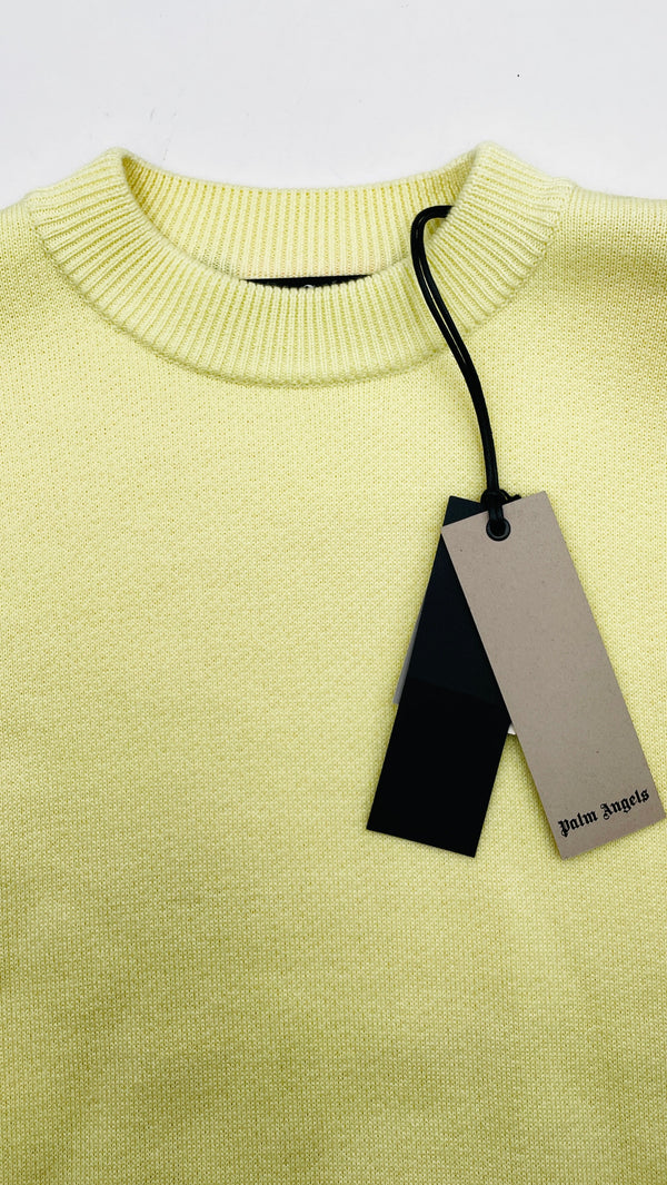 Maglione oversized con cartellino