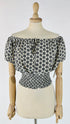 Top floreale all-over