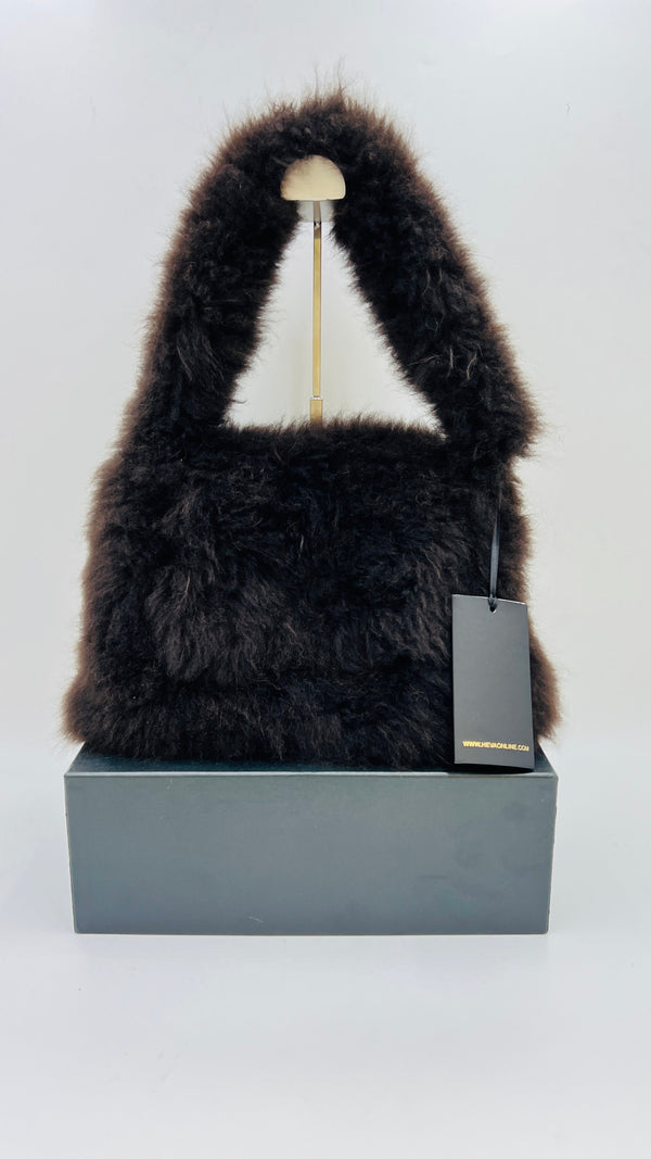 Borsa in pelliccia con cartellino