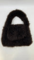 Borsa in pelliccia con cartellino
