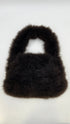 Borsa in pelliccia con cartellino